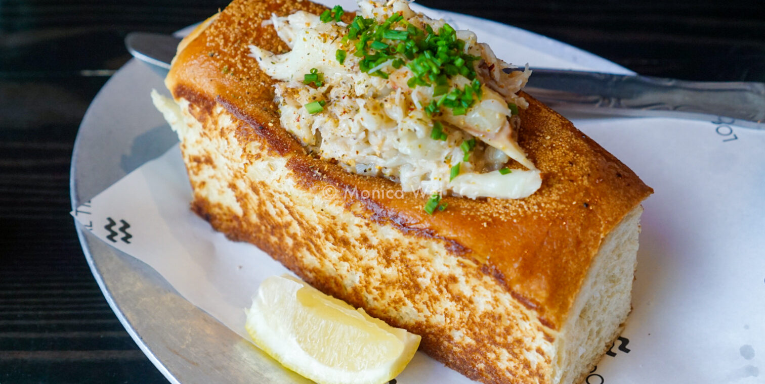 Crab Roll with lemon wedge on the side